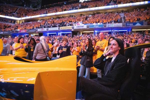  Indiana Fever Guard Caitlin Clark revs the indy car before game three of the first round for the 2024 NBA playoffs between the Indiana Pacers and the Milwaukee Bucks  at Gainbridge Fieldhouse. 