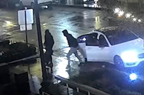 The six thieves hopped back into a white sedan that they had no<em></em>nchalantly left running outside with its hazards on for the heist.