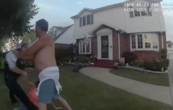A shirtless Grisanti shoves a cop during a 2020 altercation.