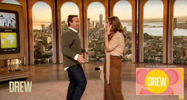 As the crowd cheered, the 