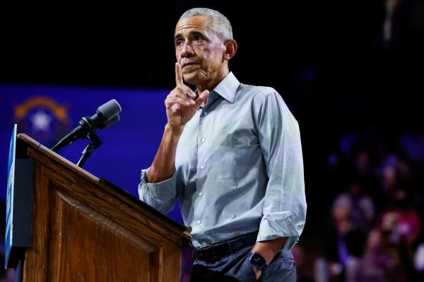Former U.S. President Barack Obama speaks at a campaign rally.