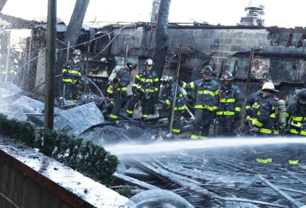 Firefighters at the scene of 62-16 