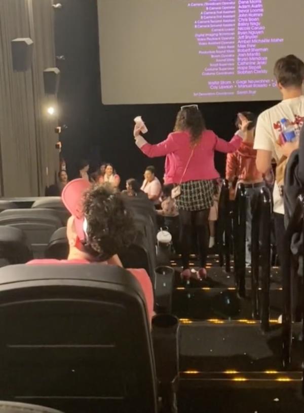 The video, which was posted Mo<em></em>nday by TikTok user Sophia Ferreira, shows tons of pink-wearing fans angrily accosting the woman as the credits roll. 