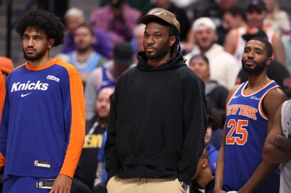 Precious Achiuwa #5 of the New York Knicks watches his team compete against the Denver Nuggets during the second half at Ball Arena on November 25, 2024 in Denver, Colorado. 