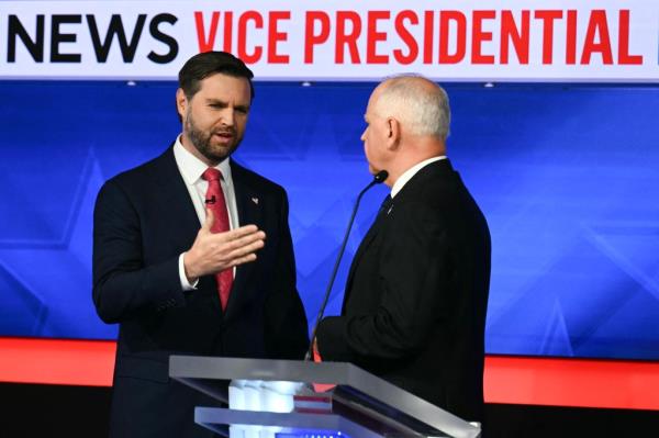“Awful,” his Republican counterpart, JD Vance, 40, said into the mic as Walz described his son’s traumatic experience. 