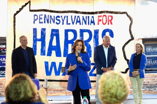 Democratic presidential nominee Vice President Kamala Harris speaks as second gentleman Doug Emhoff, from left, Democratic vice presidential nominee Minnesota Gov. Tim Walz and his wife Gwen Walz listen at a campaign event, Sunday, Aug. 18, 2024, in Rochester, Pa.