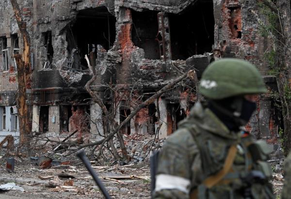 A Russian service member works on demining the territory of Azovstal steel plant during Ukraine-Russia co<em></em>nflict in the southern port city of Mariupol, Ukraine May 22, 2022. 