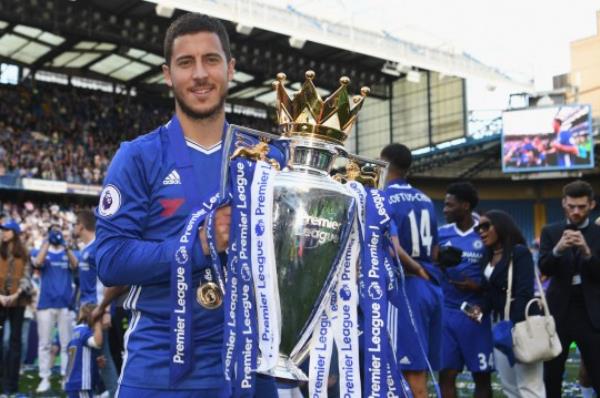 Eden Hazard of Chelsea poses with the Premier League trophy