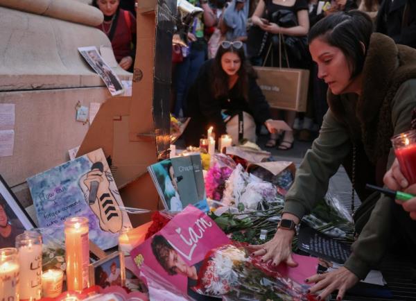 Attendees made posters to pay tribute to the fallen singer. 