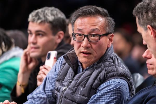 Nets owner Joe Tsai looks on in the first half against the Denver Nuggets