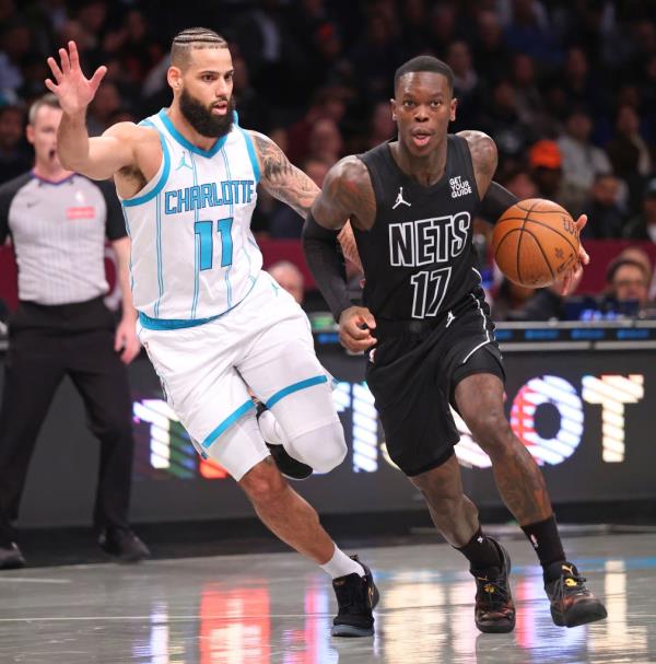 Nets drives down court as Cody Martin #11 of the Charlotte Hornets gives chase during the first half when the Brooklyn Nets played the Charlotte Hornets Tuesday, November 19, 2024 at Barclays Center in Brooklyn, NY.