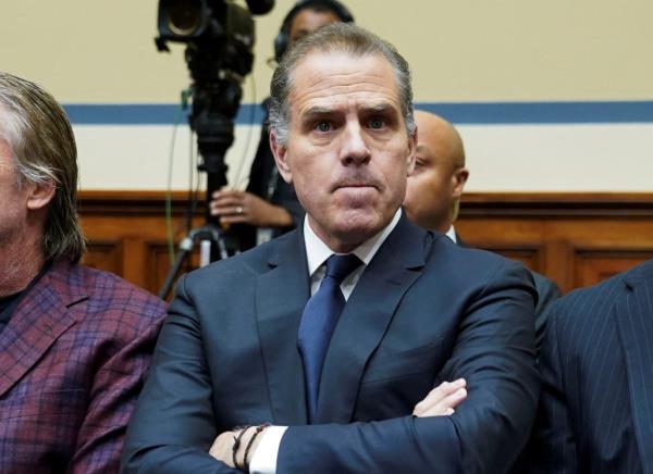 Hunter Biden, son of U.S. President Joe Biden, is seen as he makes a surprise appearance at a House Oversight Committee markup and meeting to vote on whether to hold Biden in co<em></em>ntempt of Co<em></em>ngress for failing to respond to a request to testify to the House last month, on Capitol Hill in Washington, U.S., January 10, 2024.