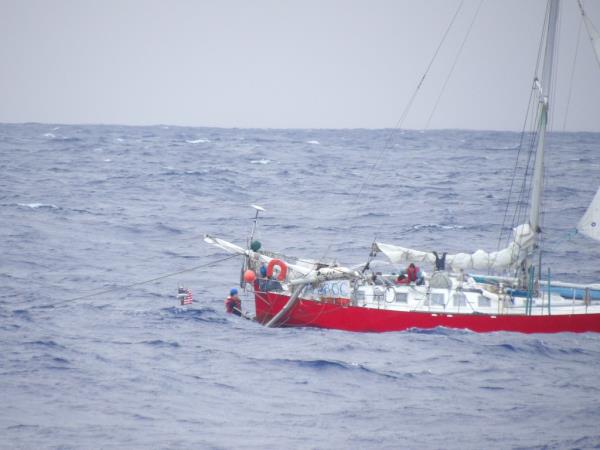 The sailboat, a 47-foot French-flagged vessel named Albroc, was first spotted by the Hercules plane. When it was within range, it picked up the 47-year-old woman’s mayday call. 