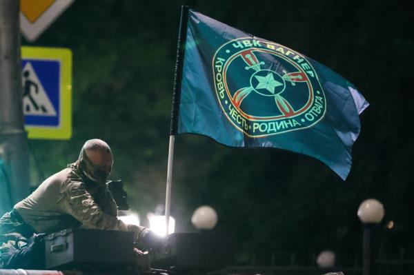 A PMC Wagner fighter is seen in a street, in Russia's Rostov-on-Don, June 24, 2023.