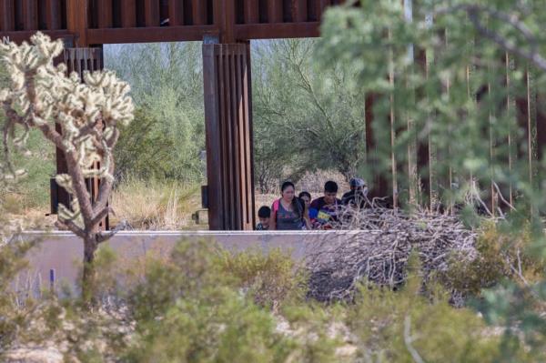 Migrants who enter through the open gates are not trying to hide from Border Patrol. Instead, they seek out agents so they can turn themselves in and try to claim asylum.