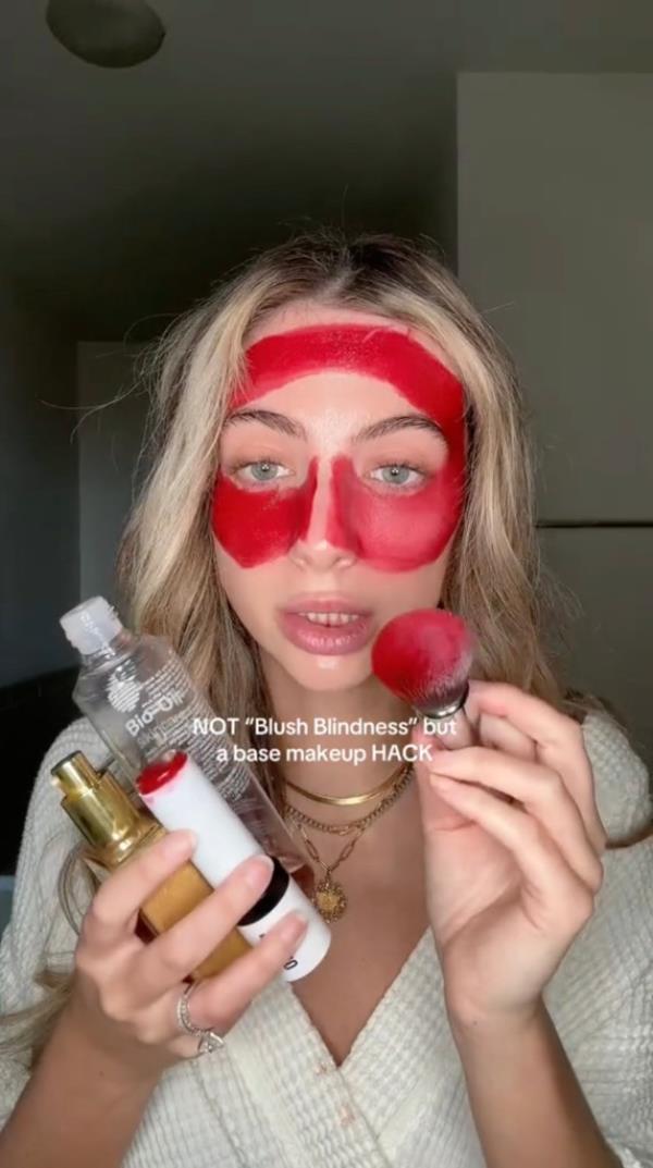 Rachel Carlisle with bright red blush on her face