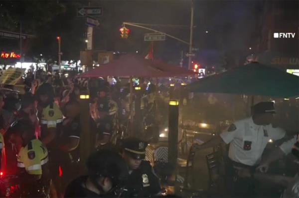 While protesters were escorted out of the main rally, the demo<em></em>nstration took an ugly turn in front of a restaurant wher<em></em>e some rallygoers gathered.