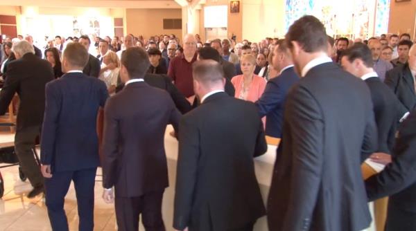 The Gaudreau brothers' caskets entering the church.
