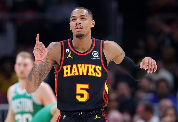  Dejounte Murray #5 of the Atlanta Hawks reacts after drawing a foul on a basket