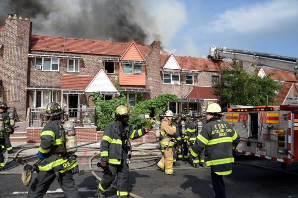 Firefighters at the scene of a five alarm fire in Queens on Aug. 3, 2024.