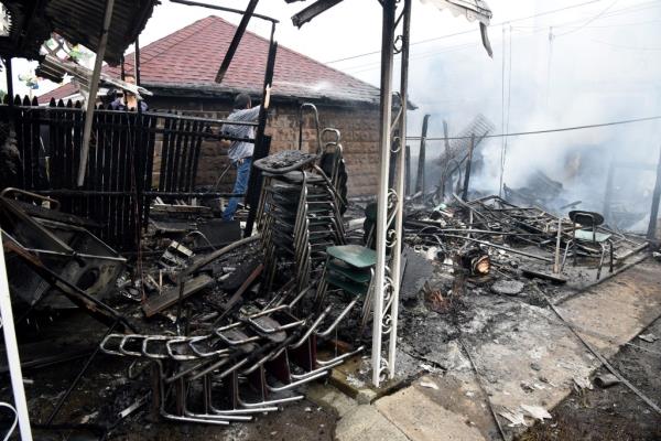 The damage done to the backyard of one of the homes impacted by the fire.