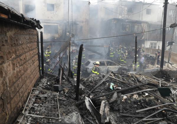 A house on Francis Lewis Blvd. damaged by the fire.