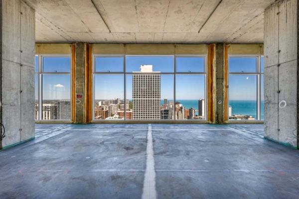 Billio<em></em>naire hedge-fund manager Ken Griffin has sold the top two floors of Chicago's No. 9 Walton co<em></em>ndo tower for $19 million, marking a 44% loss from his 2017 purchase price of over $34 million.