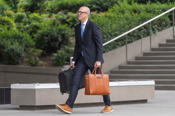 Federal prosecutor Leo Wise arrives at federal court, Wednesday, May 22, 2024