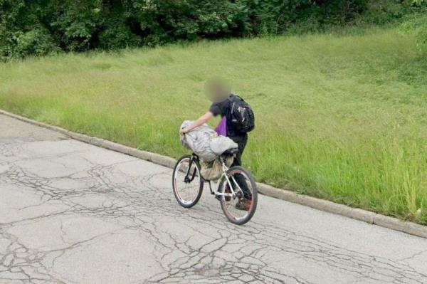 Google has since blurred the gray bag-like object.