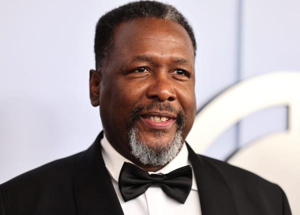Wendell Pierce, dressed in suit and bow tie, attending The 77th Annual Tony Awards at David H. Koch Theater.