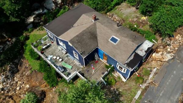 The Nugent's house is situated above a creek. The entire yard to one side fell away as it was eroded into the creek bed