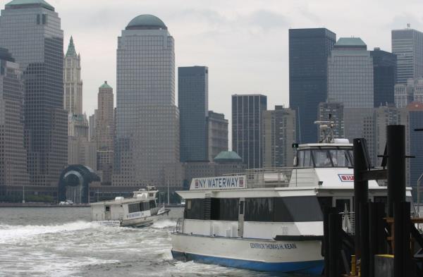 New York Waterway ferries leave a dock in Jersey City, N.J.