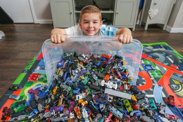 Charlie Yates, 8 in his home in Walsall, 
