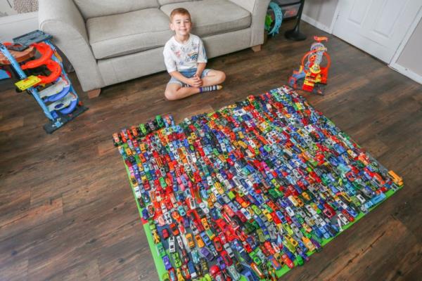 Charlie Yates, 8 in his home in Walsall, 