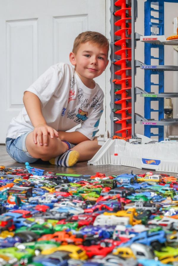 Charlie Yates, 8 in his home in Walsall, 