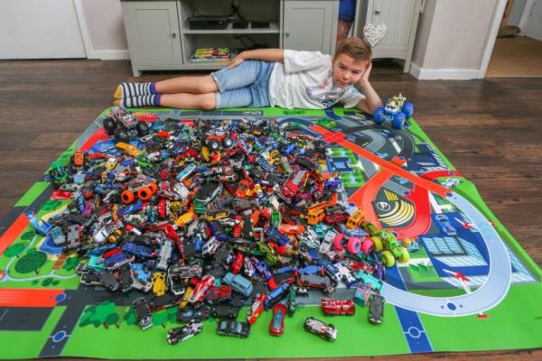 FOR METRO- Charlie Yates, 8 in his home in Walsall, West Mids on July 27 2023. Charlie has approximately over 750 hot wheels, including a selection of ramps, tracks and garages to store the wide collection.