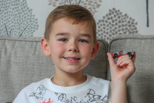 Charlie Yates, 8 in his home in Walsall, 
