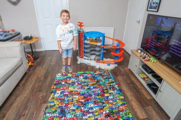 Charlie Yates, 8 in his home in Walsall, 