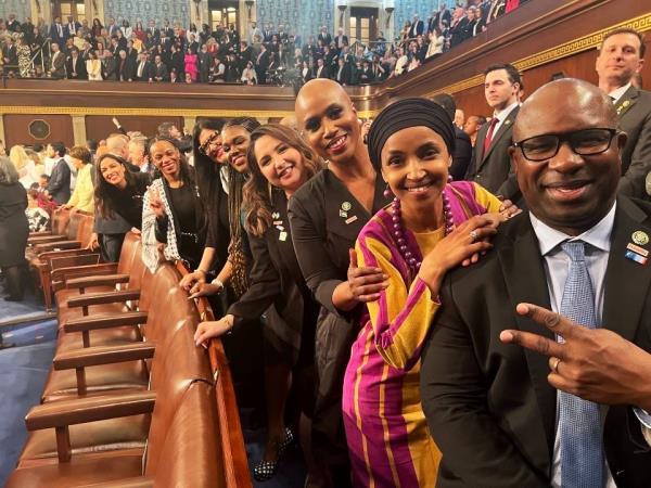 Group photo of Rep. Jamaal Bowman with 'The Squad' members Ilhan Omar, Ayanna Pressley, Cori Bush, Rashida Tlaib, Summer Lee, and Alexandria Ocasio-Cortez, alo<em></em>ngside an unidentified person