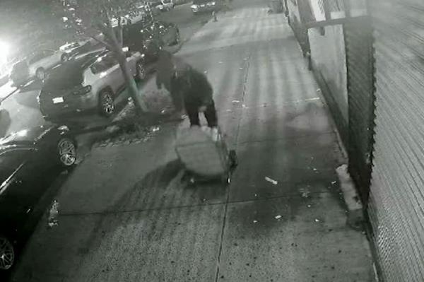 Footage of body parts in laundry cart,