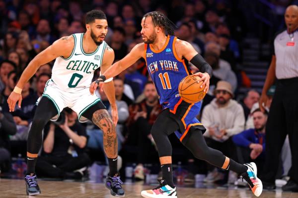 Jalen Brunson is defended by Jayson Tatum on Feb. 24, 2024. 