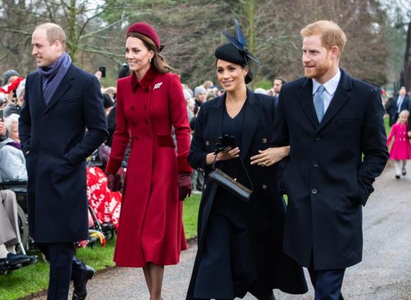 Queen Elizabeth and members of the Royal Family walking on a path to attend the Christmas Day service at St. Mary Magdalene Church, Sandringham. Featuring Prince Harry, Meghan Markle, Prince William, and Kate Middleton.