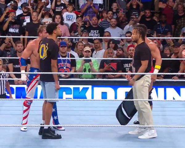 Jalen Brunson joins LA Knight to co<em></em>nfront Tyrese Haliburton and Logan Paul with a steel chair.