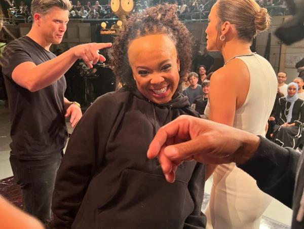 Punkie Johnson along with Colin Jost and Jennifer Lopez in the background of a photo taken by Molly Kearney that they posted on Instagram announcing their exit from 