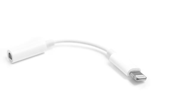 Lightning to jack 3.5mm headphone adapter isolated on white 
