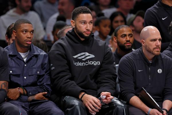 Ben Simmons (center) sits on the bench during the Nets' 121-102 loss to the Knicks.