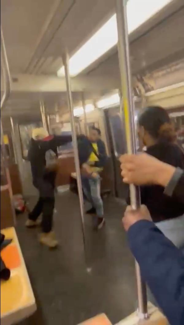 Dejuan Robinson, who was shot, and Younece Obuad fighting on the subway.