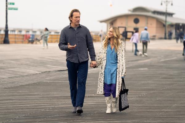Carrie and Aidan take a stroll on Co<em></em>ney Island.