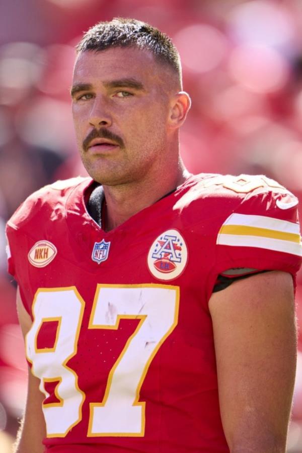 KANSAS CITY, MO - SEPTEMBER 24: Travis Kelce #87 of the Kansas City Chiefs looks on before kickoff against the Chicago Bears at GEHA Field at Arrowhead Stadium on September 24, 2023 in Kansas City, Missouri. (Photo by Cooper Neill/Getty Images)