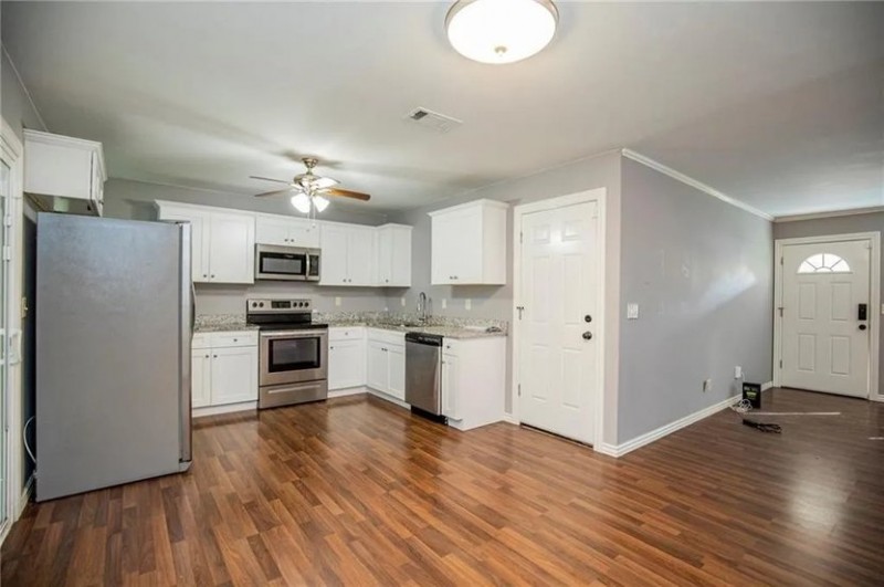 People gather around the residence of Bangladeshi prime minister in Dhaka